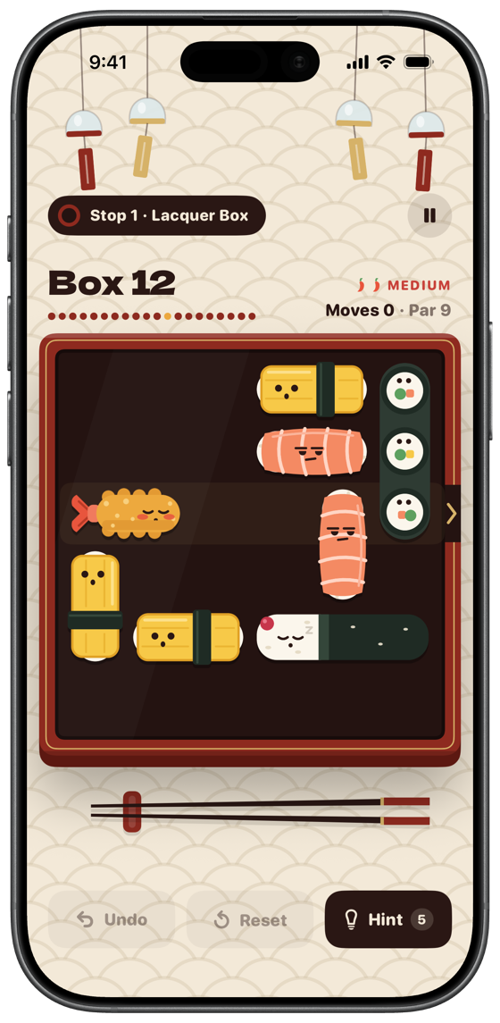 Box 12 at the Lacquer Box: Ebi waits on his row while salmon, tamago and maki block the way.